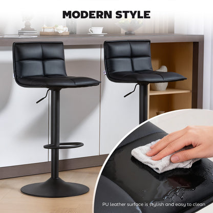 The bar stools in a kitchen with a close-up inset showing a hand cleaning the seat