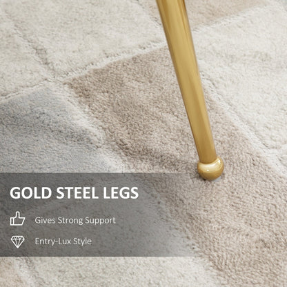 Close-up of the gold steel legs on the pink velvet dining chair