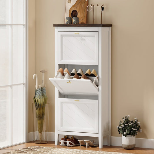 The narrow shoe storage cabinet shown in a hallway with shoes inside the open flip drawers
