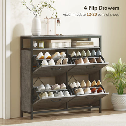 The shoe storage cabinet with all four flip drawers open showing shoes inside