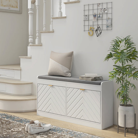 The shoe storage bench placed in a bright hallway next to a staircase and a potted plant