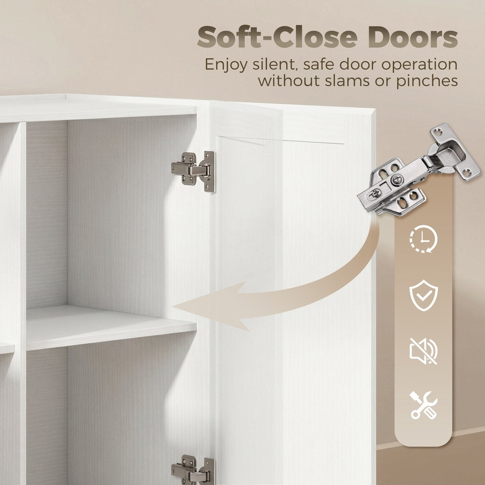 Close-up of the soft-close doors on the white storage cabinet, showing the hinges and quiet operation