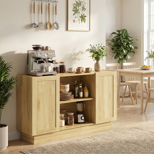 Sideboard buffet cabinet in a dining room with a coffee machine and dishes on top
