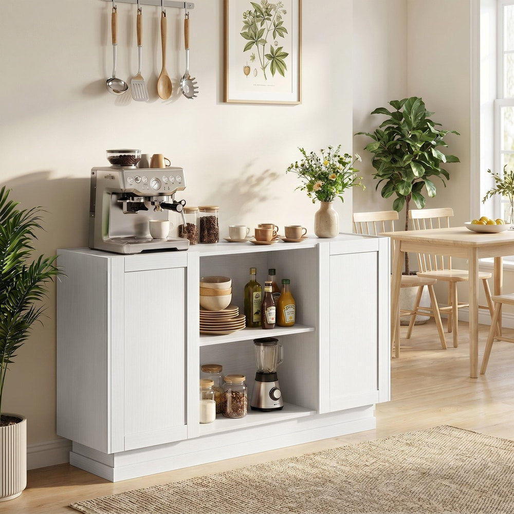 White storage cabinet with two open shelves and two cupboards, styled in a dining room with a coffee machine and dishes