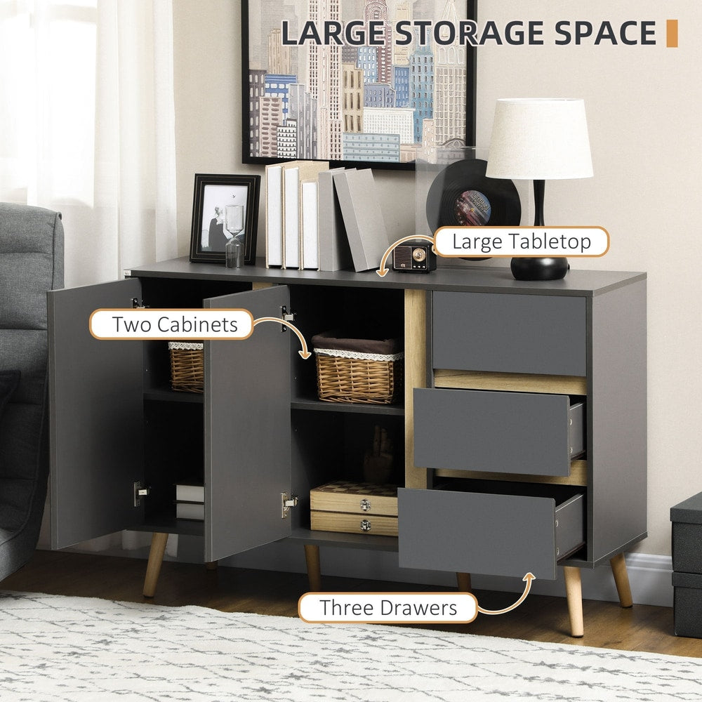 The storage cabinet with its double doors and three drawers open to show internal space