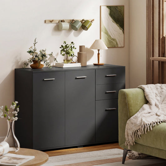 The modern storage cabinet in a living room with decorative items on top
