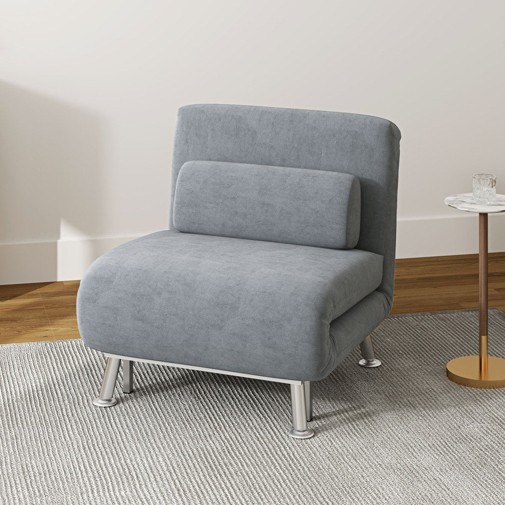 Grey velvet-feel sleeper chair in a living room setting, showing its comfortable design