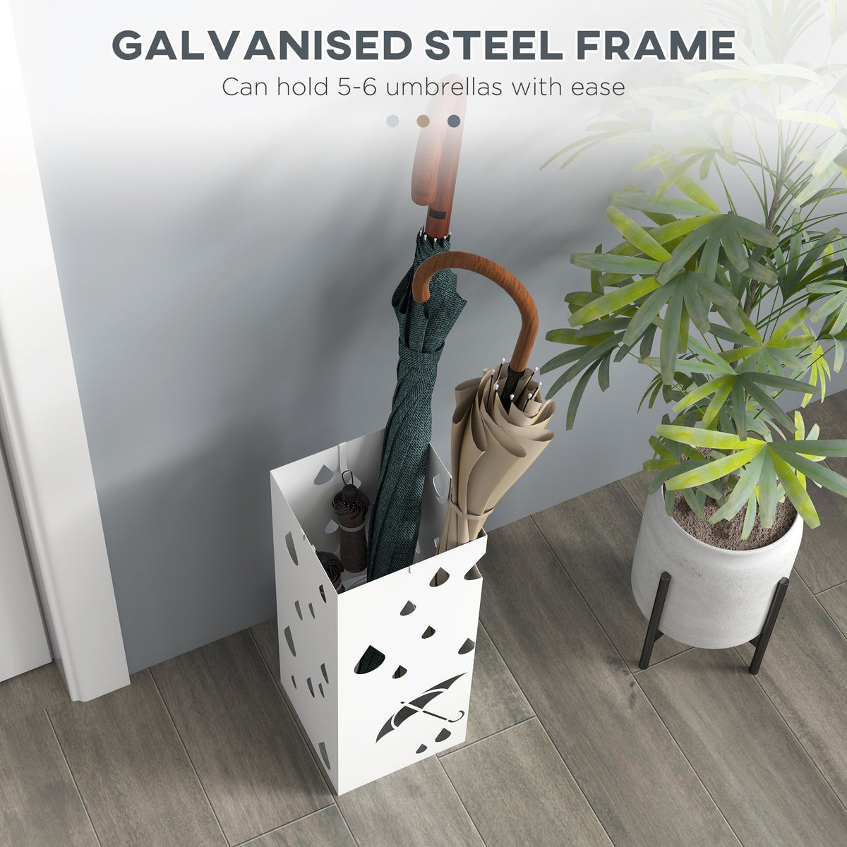 The umbrella stand holding multiple umbrellas next to a plant with text about the frame