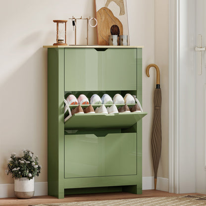 The narrow shoe cupboard is shown in a hallway with shoes inside the open flip drawers