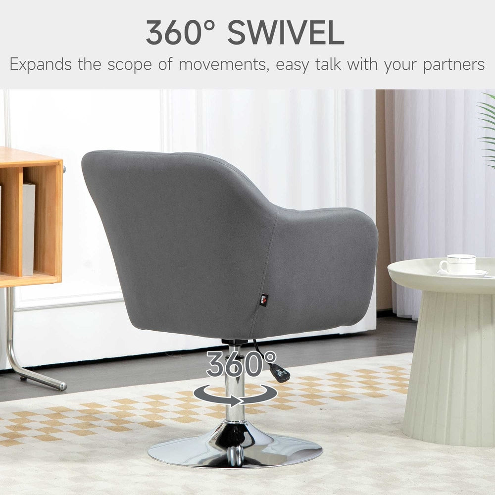 The dark grey armchair shown swivelling on its base