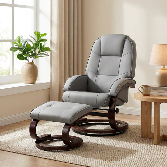 The grey PU leather armchair and footstool in a living room setting with a plant and lamp