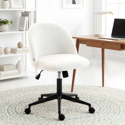 The cream white teddy fleece office chair with wheels is shown in a home office setting