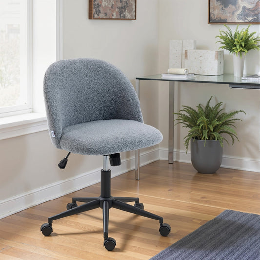 Grey teddy fleece office chair in a modern home office setting next to a desk