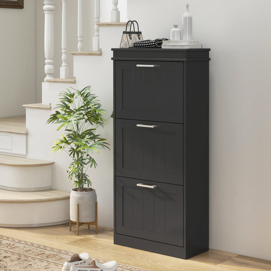 The black shoe storage cabinet placed in a hallway next to a staircase and a potted plant