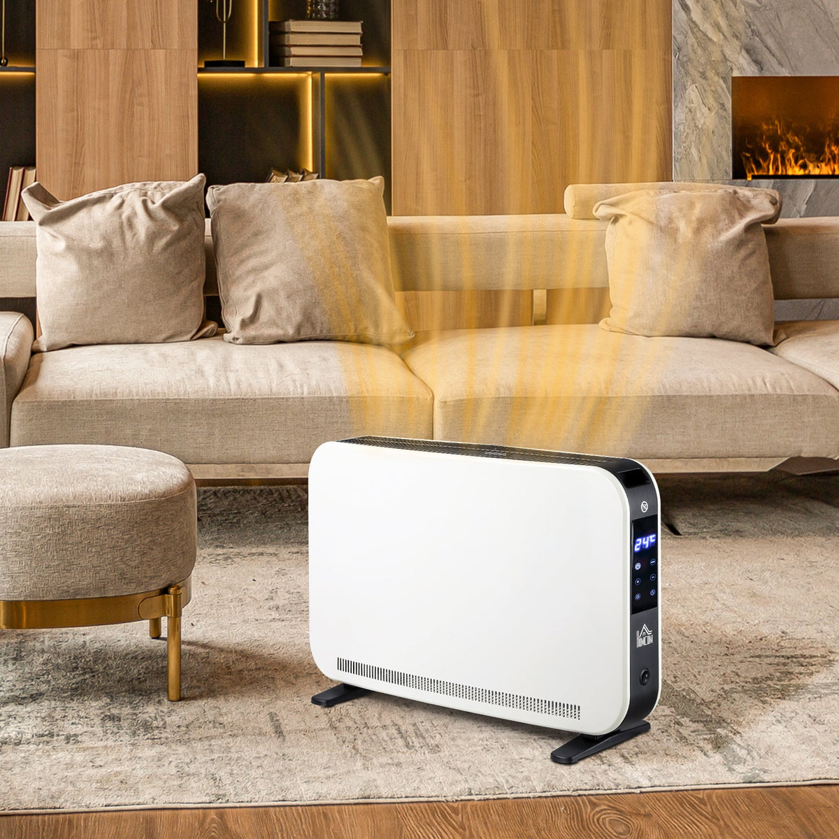 The modern slimline heater is placed in a living room setting on a rug in front of a sofa