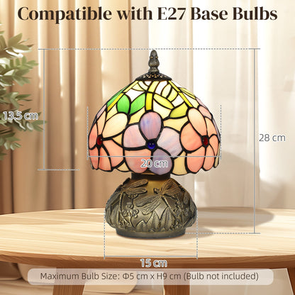 The table lamp on a wooden table with lines indicating the height and width dimensions