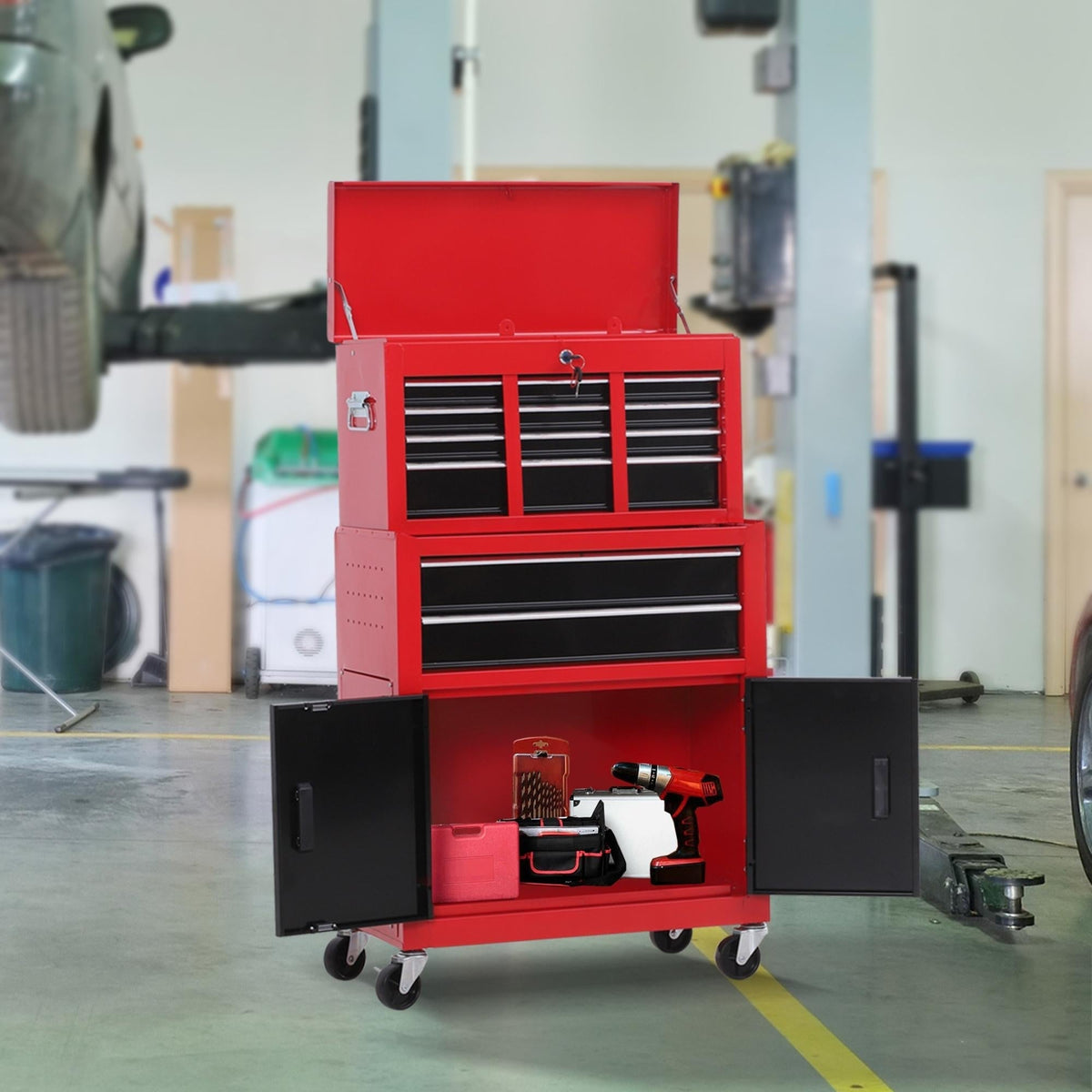 The tool cabinet standing in a garage with the bottom doors open and tools inside