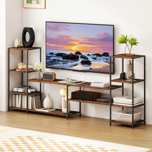 The TV unit in a living room with a TV on the main shelf and decorative items on the side shelves