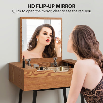 A woman applying makeup while looking into the open mirror of the dressing table