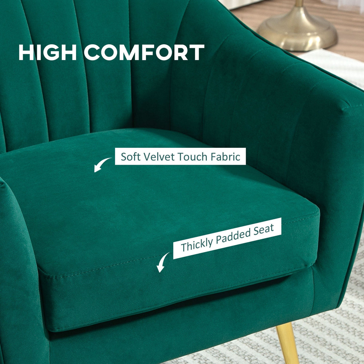 Close up of the green velvet accent chair showing soft fabric and padded seat