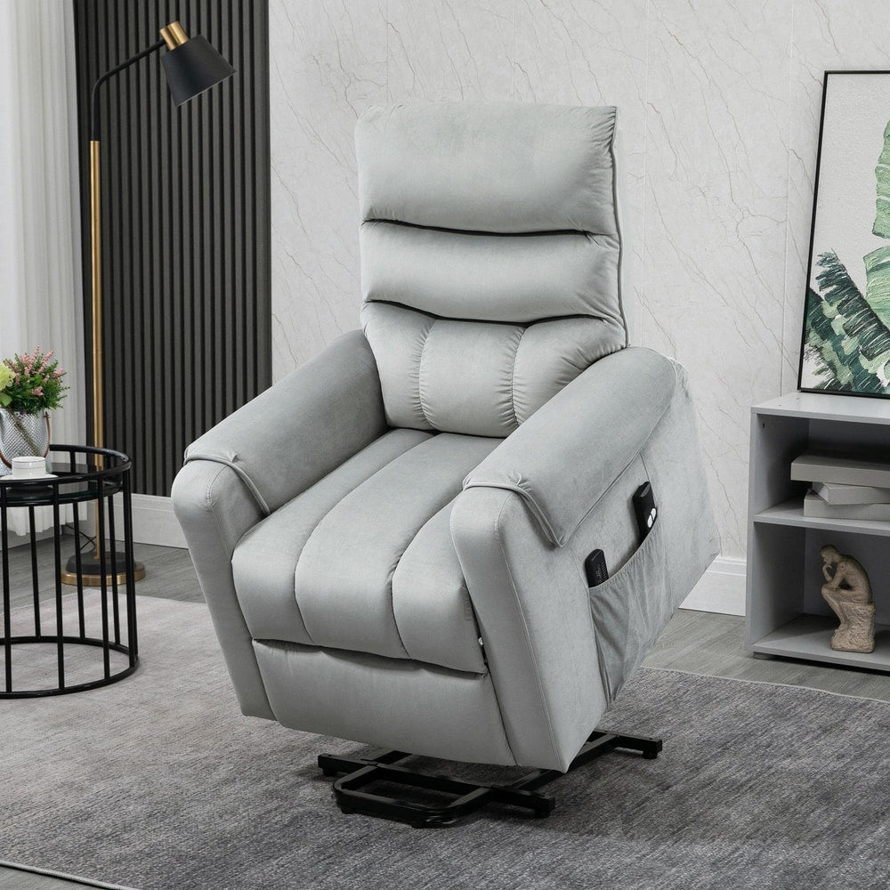 Grey electric power lift recliner chair in a living room setting