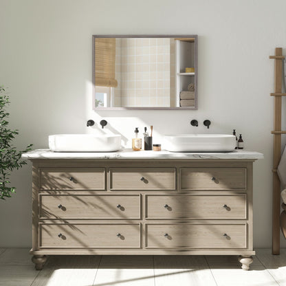 The wall mirror is displayed above a large wooden dresser in a bedroom