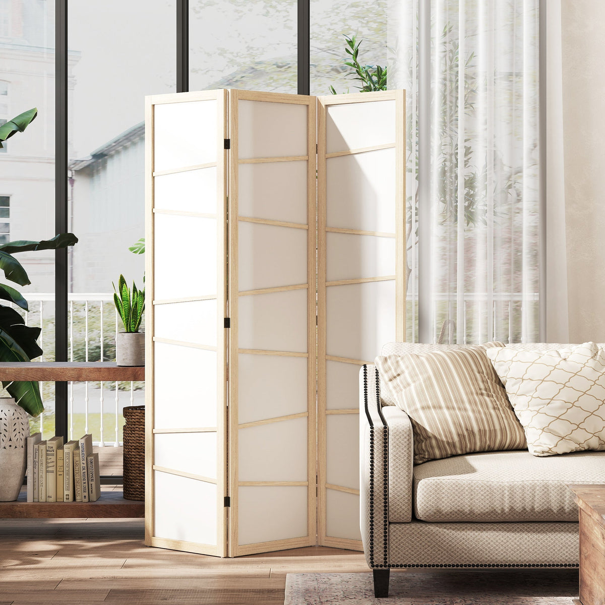 The room divider standing in a bright living room next to a sofa and a large window