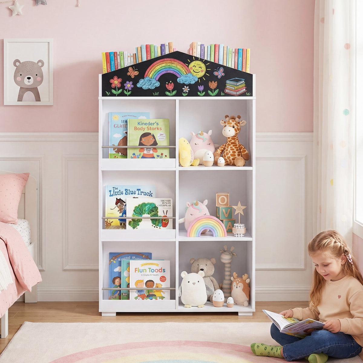 Children reading books next to the house shaped toy storage organiser