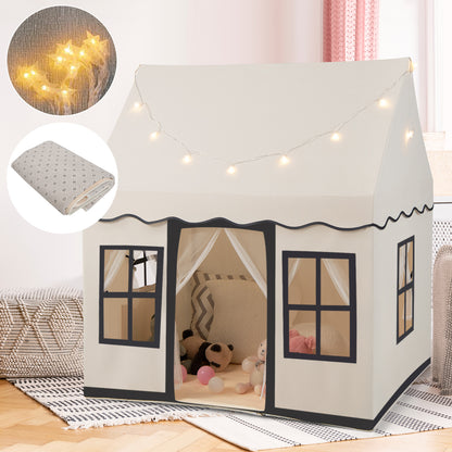 The fabric playhouse with inset circles showing the star lights and the floor mat