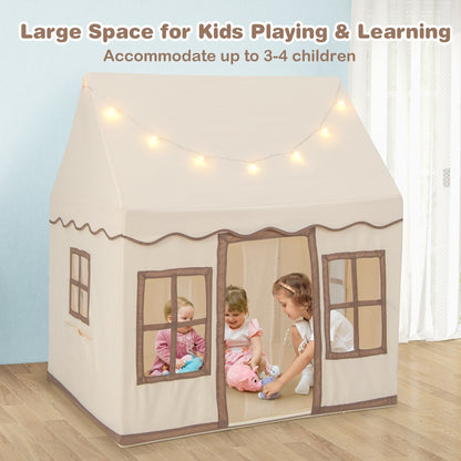 Three children playing inside the spacious play tent with star lights, set up in a living room