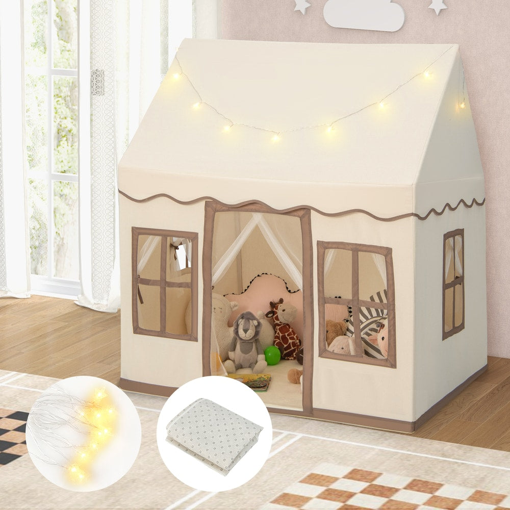 The brown and cream play tent with star lights, with a folded mat and scattered lights