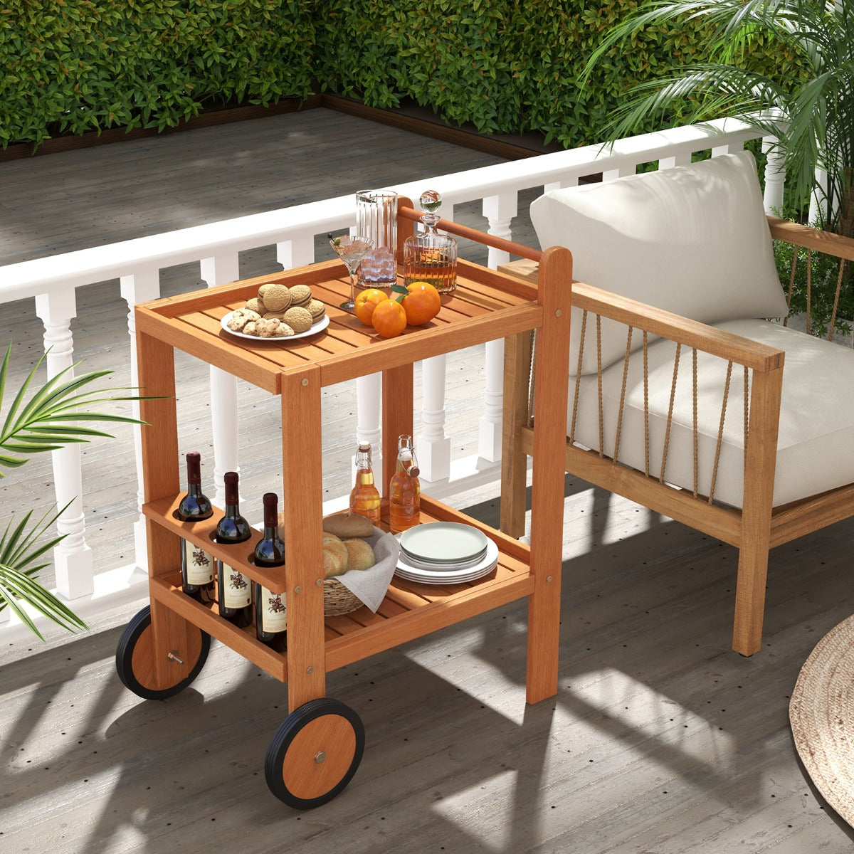 The kitchen island cart holding snacks and drinks on a wooden balcony deck