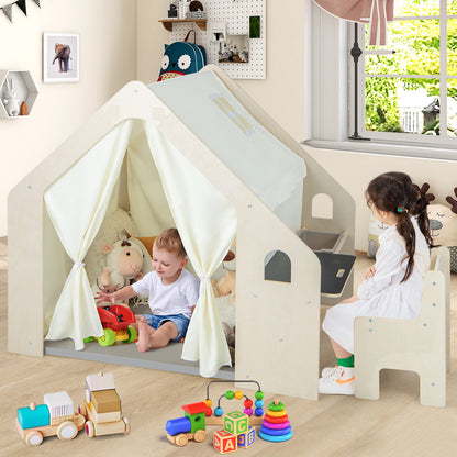 The wooden playhouse with a storage bin and chair surrounded by various toy blocks