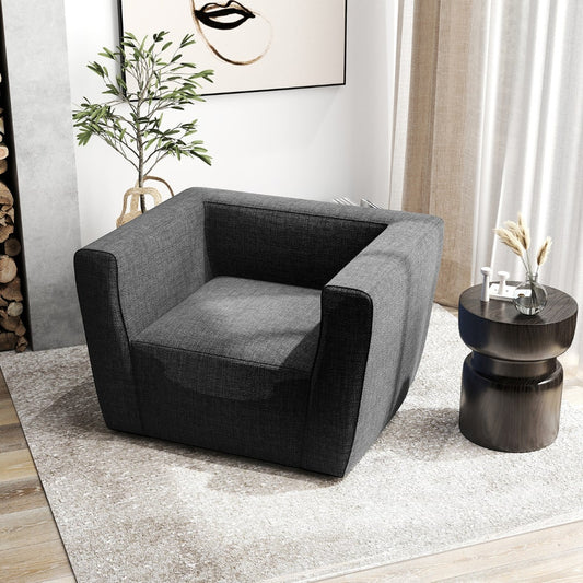 The grey inflatable sofa is shown in a modern living room setting next to a side table