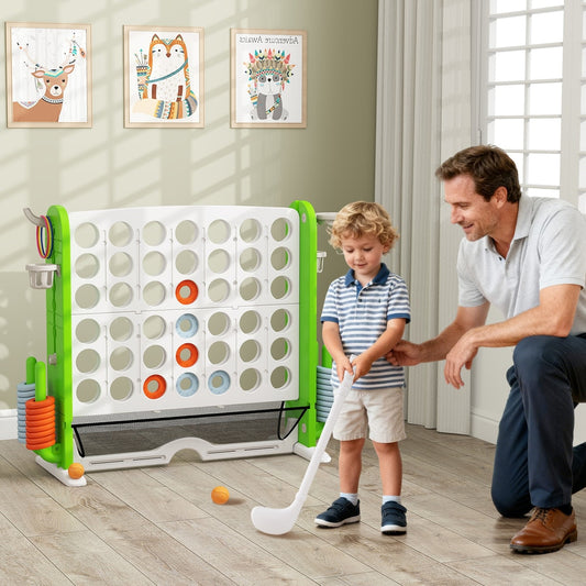 Father and son playing the giant four in a row game set with basketball hoop indoors