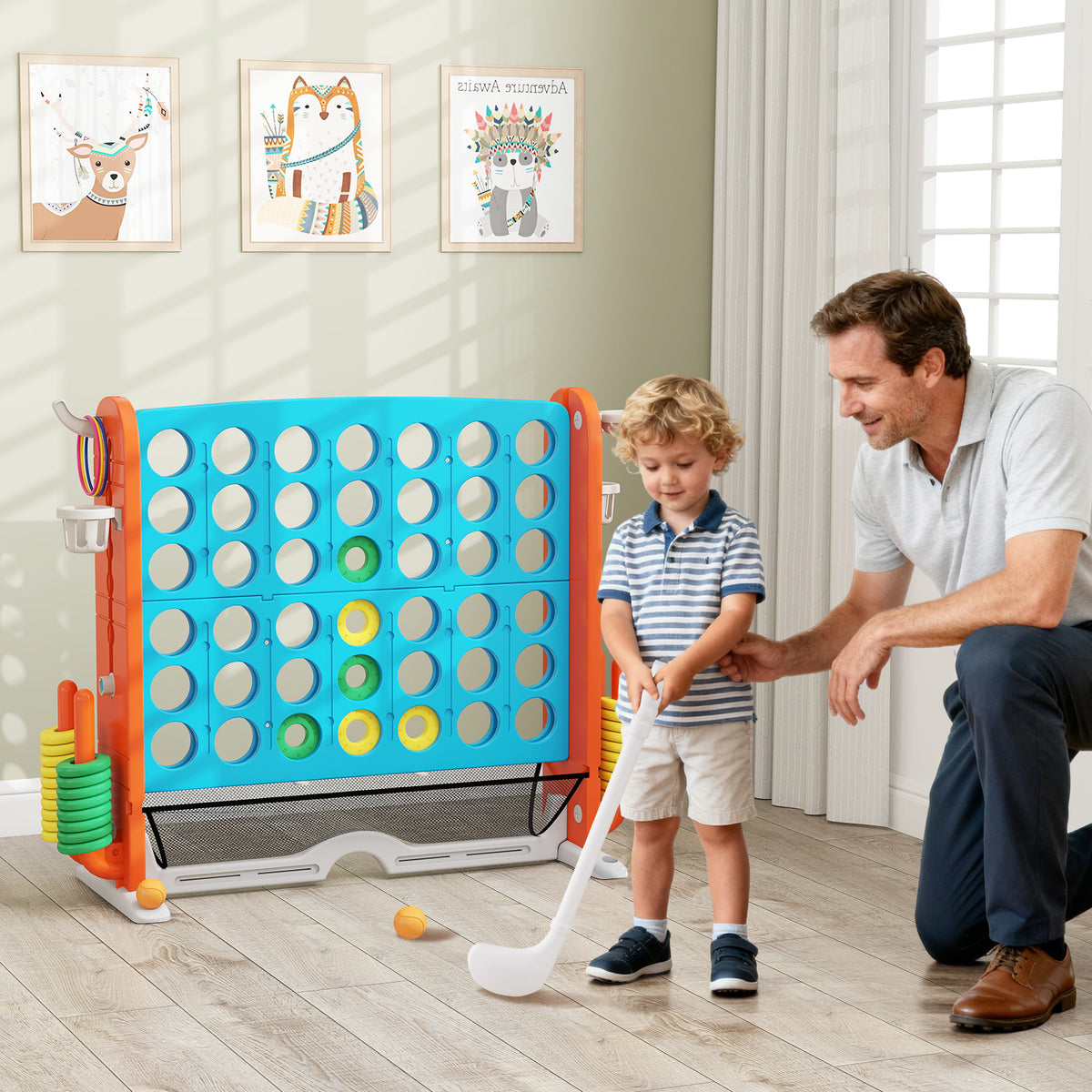 Father and son playing the lawn game indoors with a basketball hoop