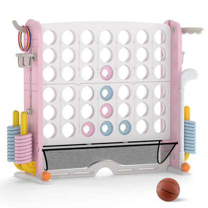 The pink and white jumbo connect four game set with a basketball on the floor