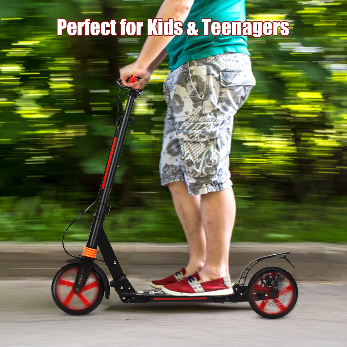 A person riding the black kick scooter with red wheels on a paved path