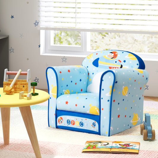 The kids armchair with soft cushion and cute pattern in a child's bedroom next to a table