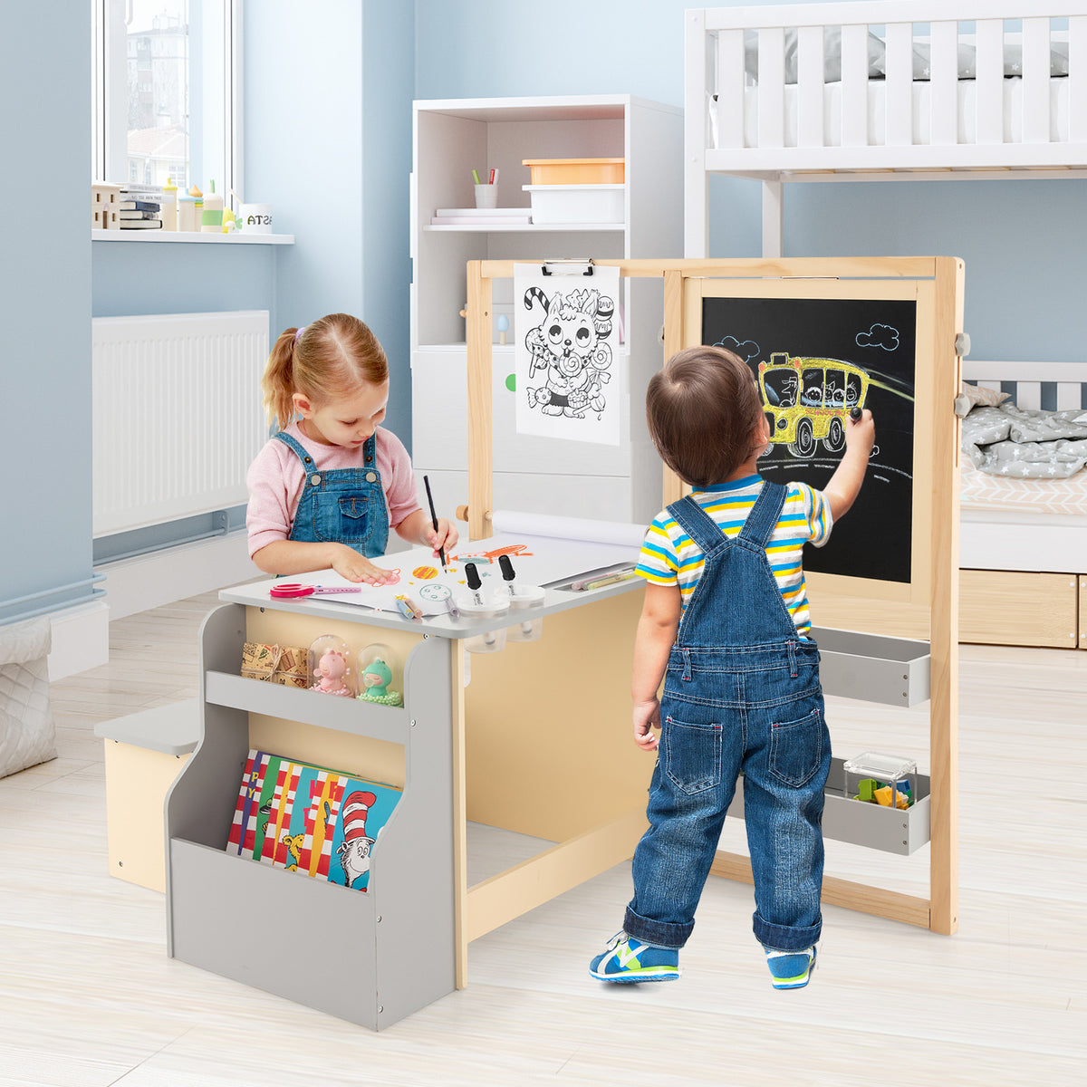 Children using the kids art easel table and bench set in a bright room