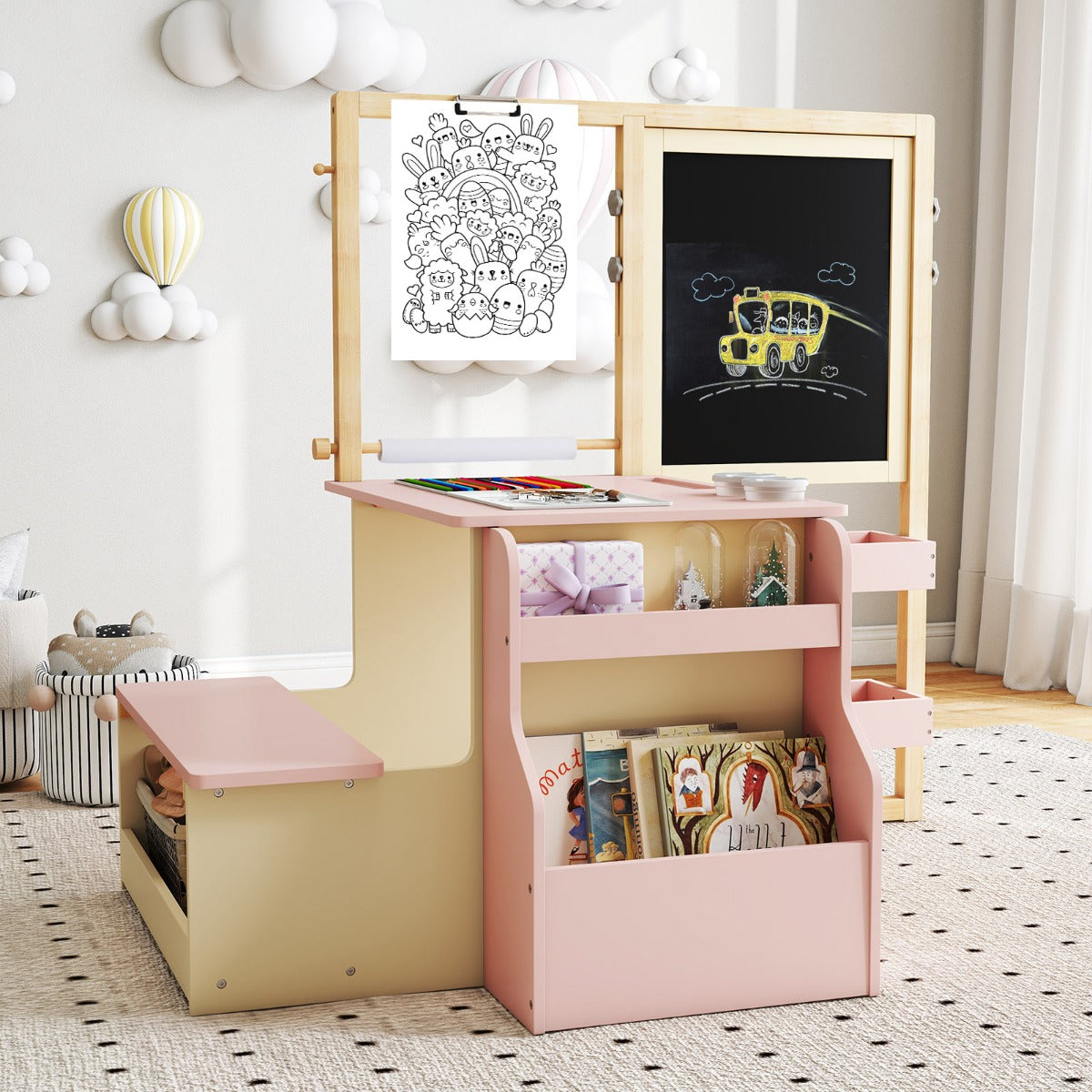 The pink kids table and chair set with a bookshelf and easel