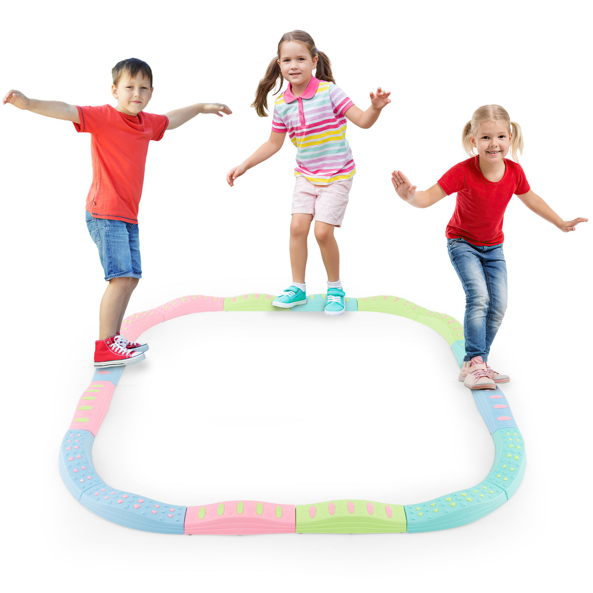 Three children balancing on the colourful toy sports beams arranged in a square shape