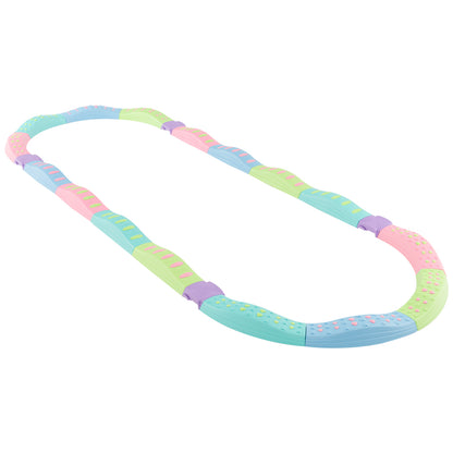 The toy sports beams connected in a long oval track configuration