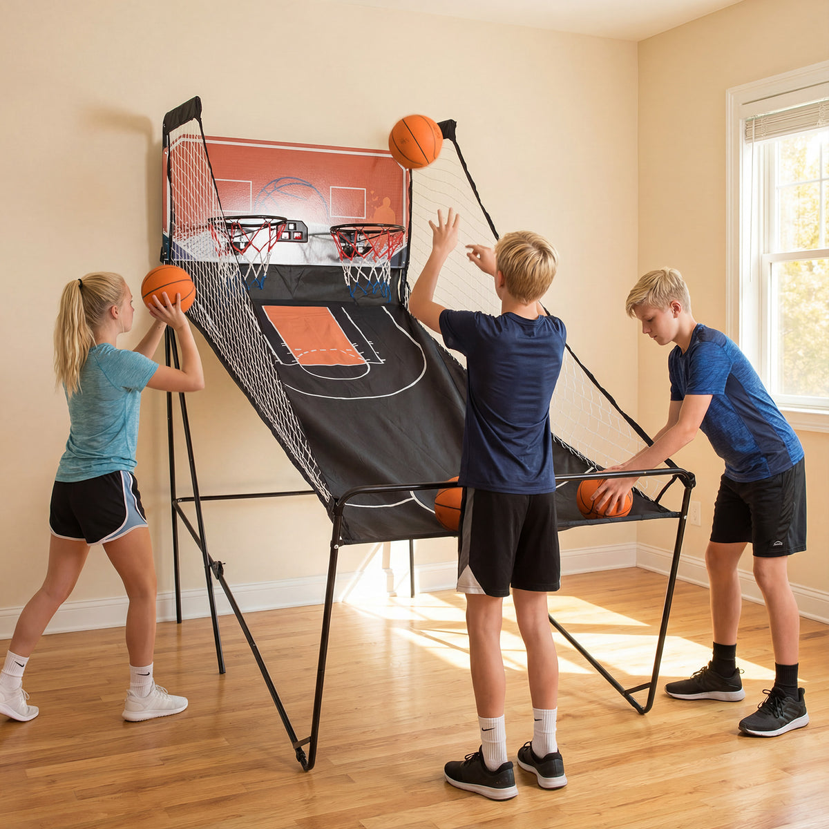 Children playing with the game room basketball hoop machine indoors