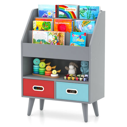 A grey wooden bookshelf filled with children's books and toys