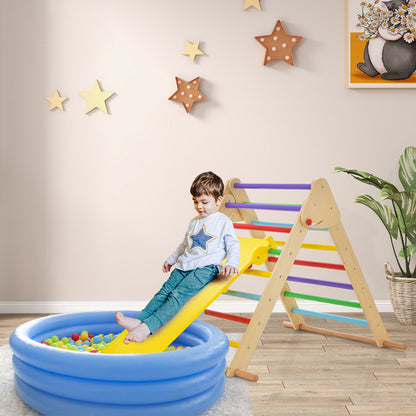 The wooden climbing frame with a slide is placed next to a paddling pool