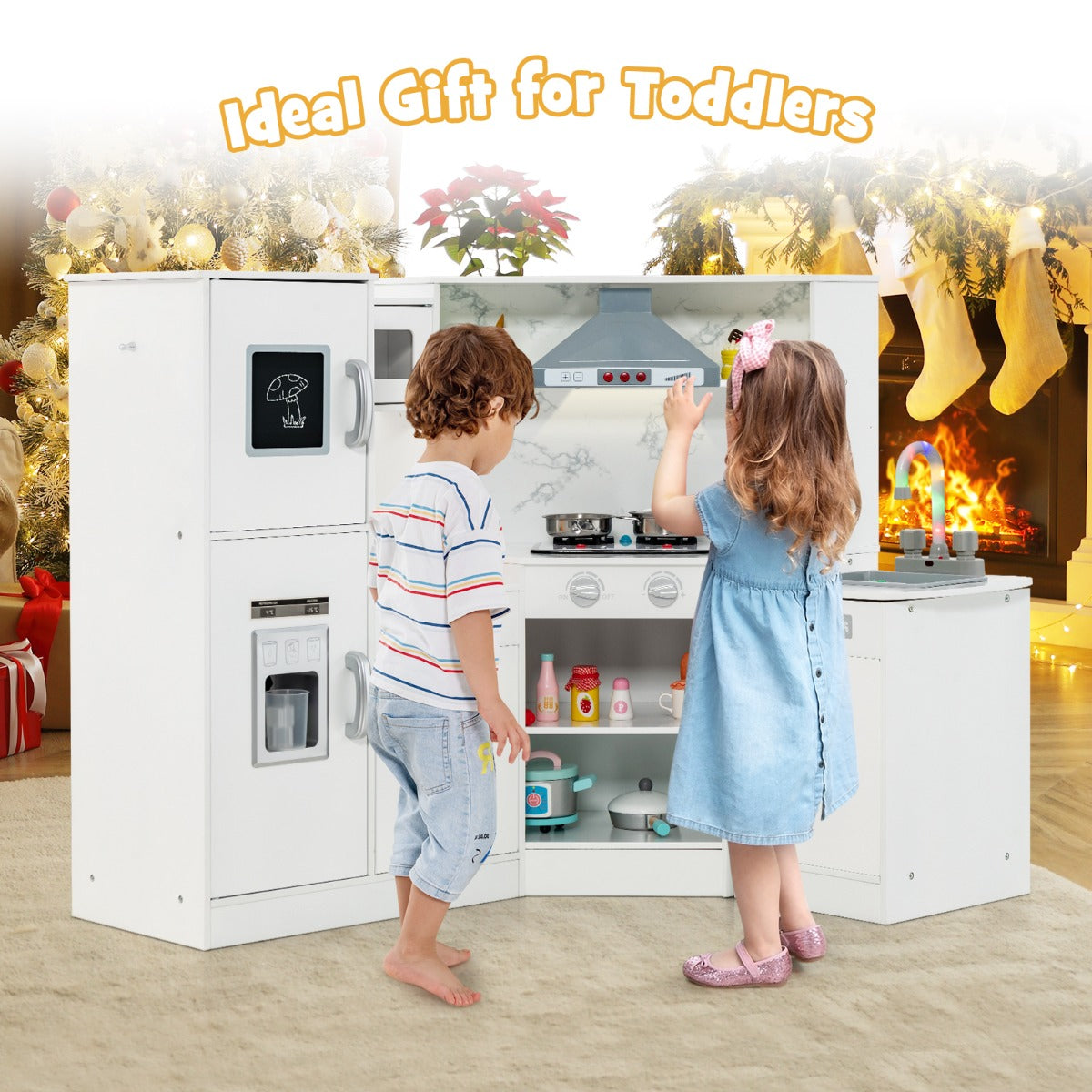 Two children playing with the white corner play kitchen set with a washing basin