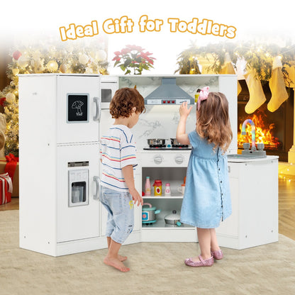 Two children playing with the white corner play kitchen set with a washing basin
