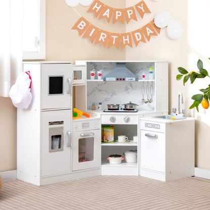The white corner play kitchen set with a washing basin, shown in a room with birthday decorations