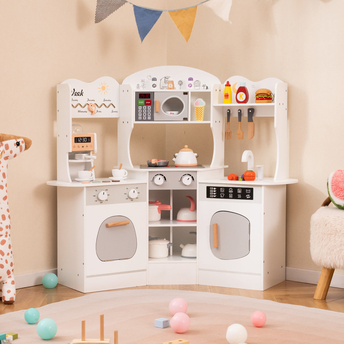 The play kitchen set placed in a corner of a child's playroom with colourful balls